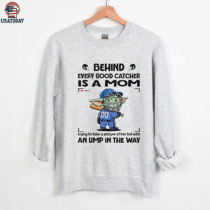 Baby Yoda behind every good catcher is a mom trying to take a picture of her shirt