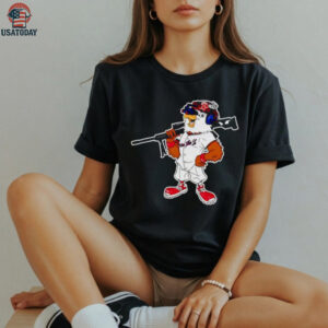 Eagle wearing baseball uniform holding a rifle shirt