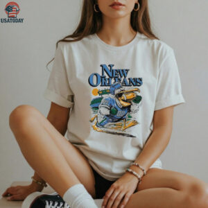 New Orleans Pelicans football player mascot running a ball shirt