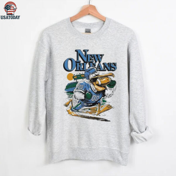 New Orleans Pelicans football player mascot running a ball shirt