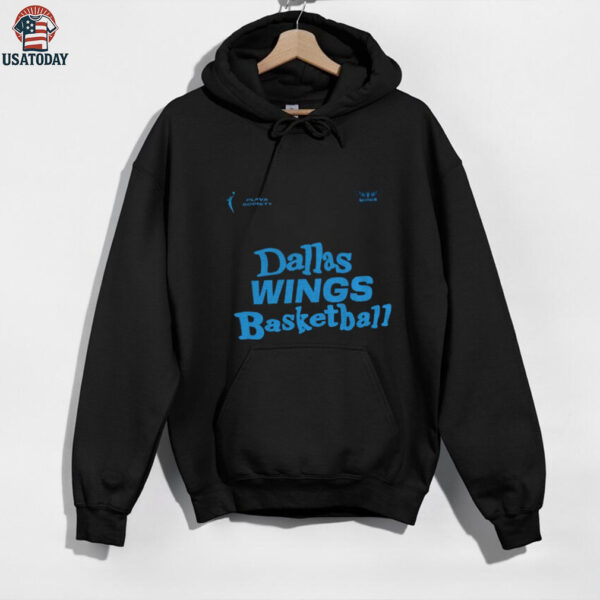 Paige Bueckers wearing Dallas Wings basketball shirt