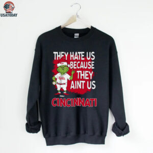 Custom Cincinnati Reds Grinch Christmas Shirt, Funny Santa Baseball Tee with Quote They Hate Us Ain’t Us, MLB Fan Gift