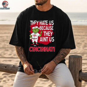 Custom Cincinnati Reds Grinch Christmas Shirt, Funny Santa Baseball Tee with Quote They Hate Us Ain’t Us, MLB Fan Gift