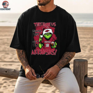 Custom Name Arkansas Razorbacks Grinch Holiday Shirt – NCAA Football Fan Tee – Xmas Gift “They Hate Us Because They Ain’t Us”