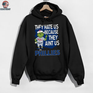 Custom Philadelphia Phillies Grinch Christmas Tee, Funny Santa Baseball Shirt with Quote They Hate Us Ain’t Us, MLB Fan Gift