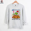 USPS x Grinch Christmas never give up shirt